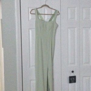 Beautiful sage dress form fitting with slit
